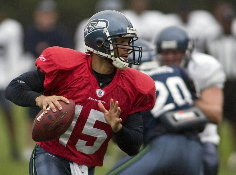 Football Player in Red Jersey — Focused