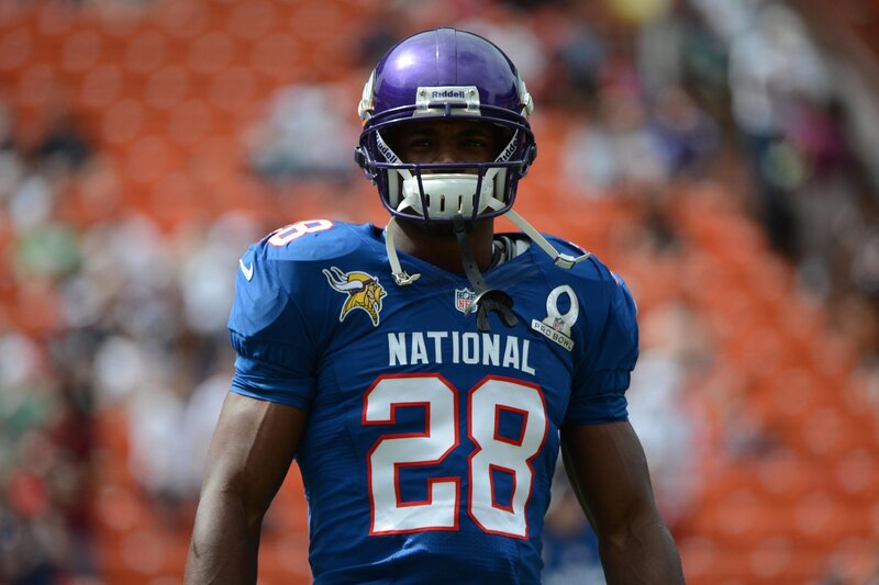 Football Player in Uniform — Blue, Focused, Afternoon