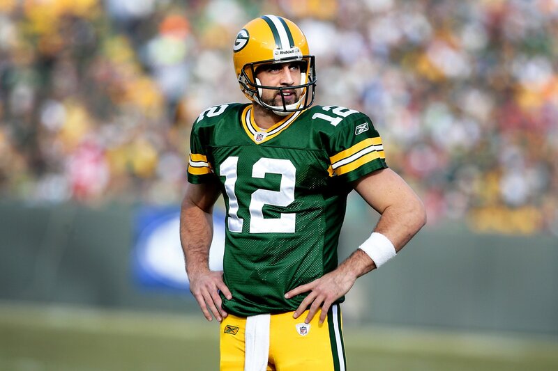 Football Player in Uniform — Green, Focused