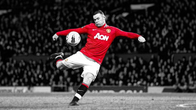 football player kicking ball