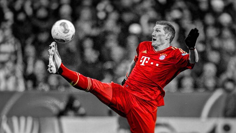 football player kicking ball