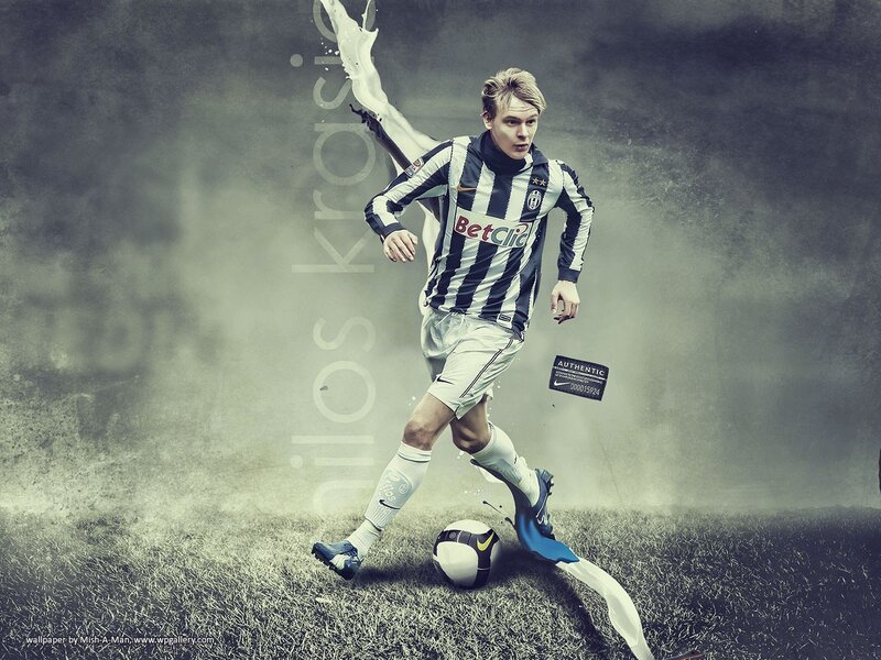 Football Player Kicking Ball — Black, Dramatic, Photograph