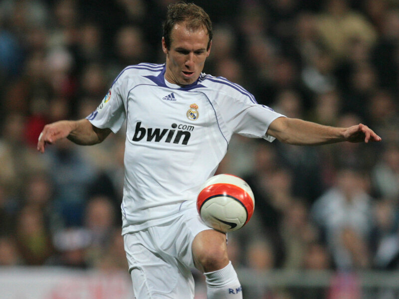 Football Player Kicking Ball — White, Active, Night
