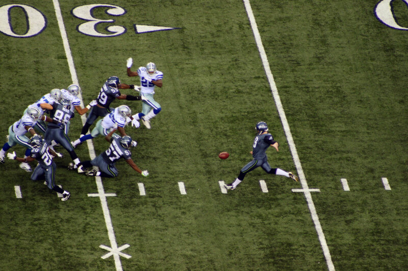 Football player kicking the ball