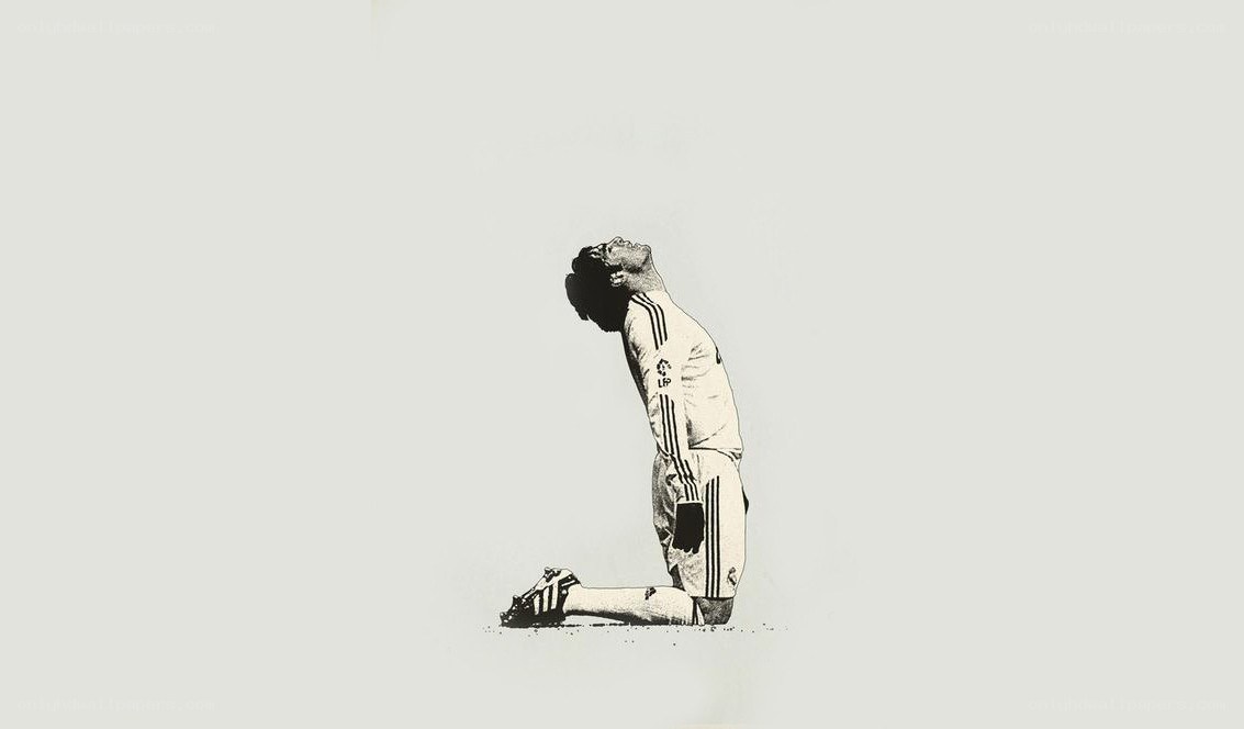 football player kneeling