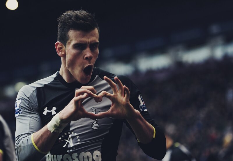 Football Player Making Heart