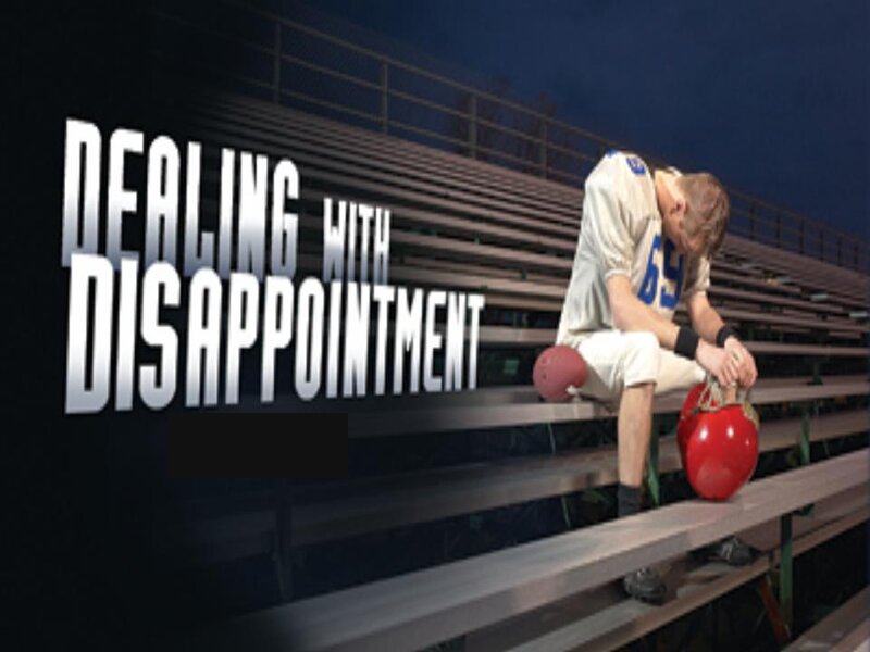 Football Player on Bleachers