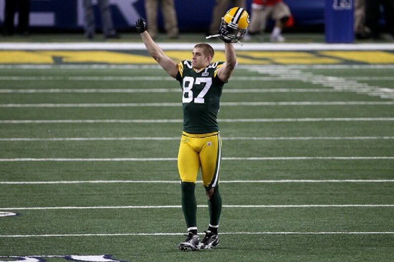 Football Player on Field — Green, Celebratory