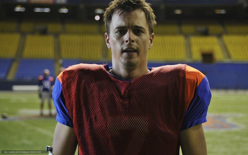 Football Player on Field — Green, Dramatic, Night