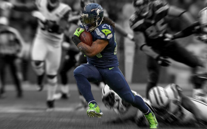 Football Player Running — Blue, Dynamic, Photograph