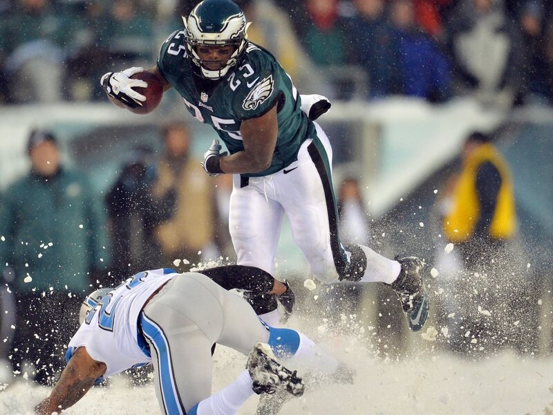 Football Player Running — Green, Dynamic, Winter