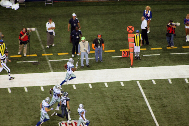 Football player running on field