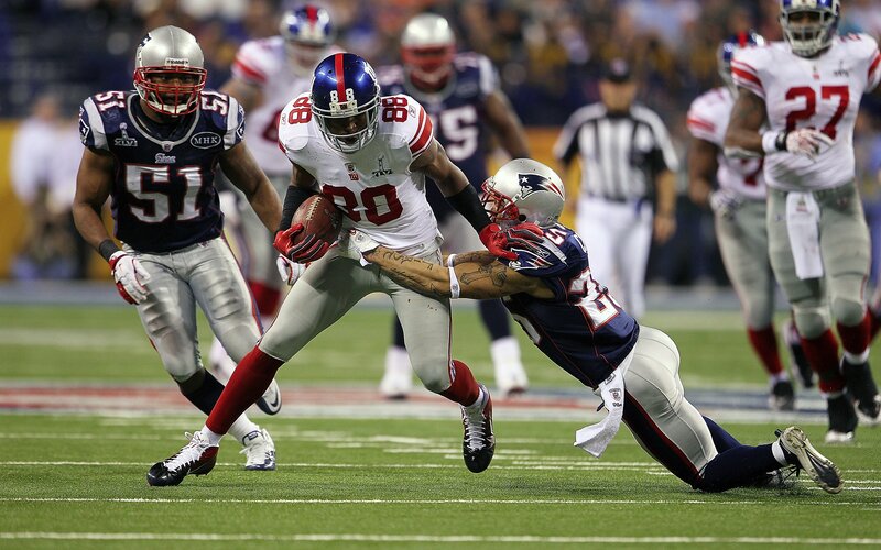 Football player running with ball