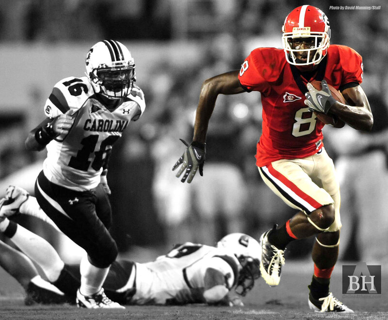 Football player running with ball