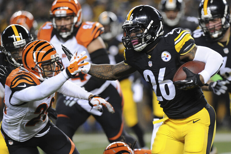 Football Player Running with Ball — Black, Intense