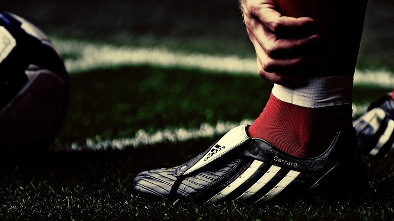 football player's foot on field