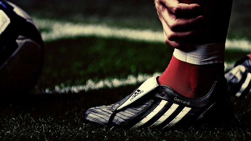 football player's foot on field