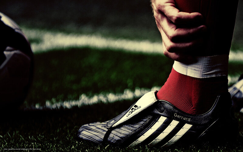 football player's foot on field