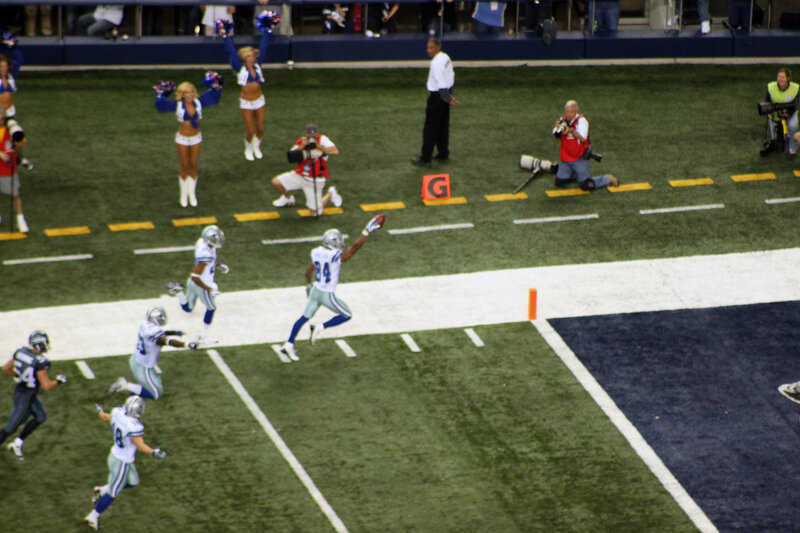 Football player scores touchdown