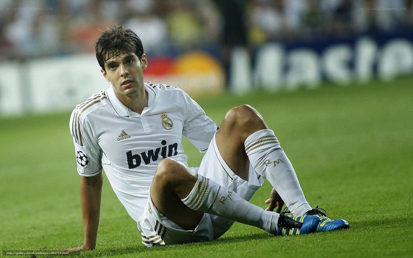 football player sitting on field