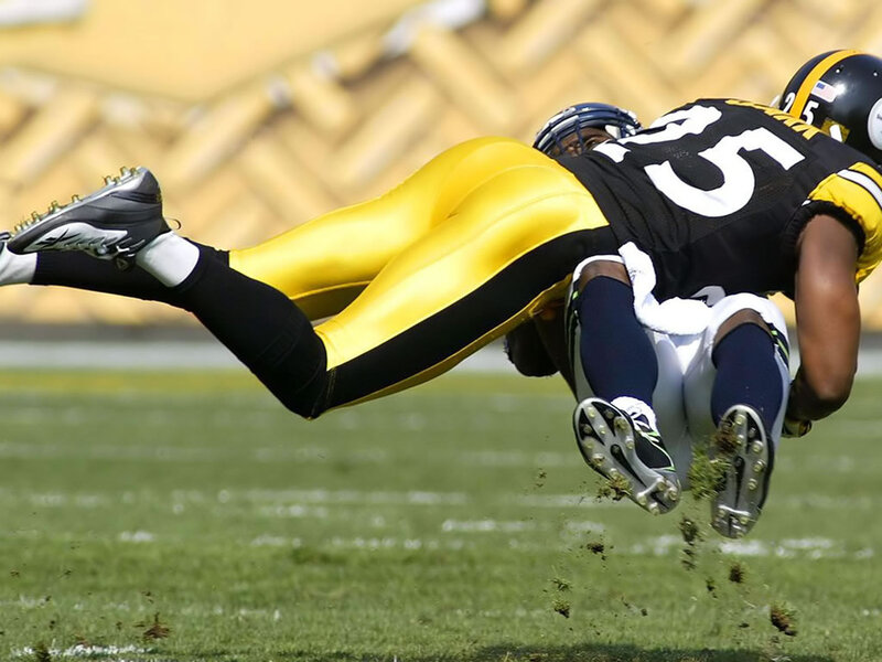 Football Player Tackling — Yellow