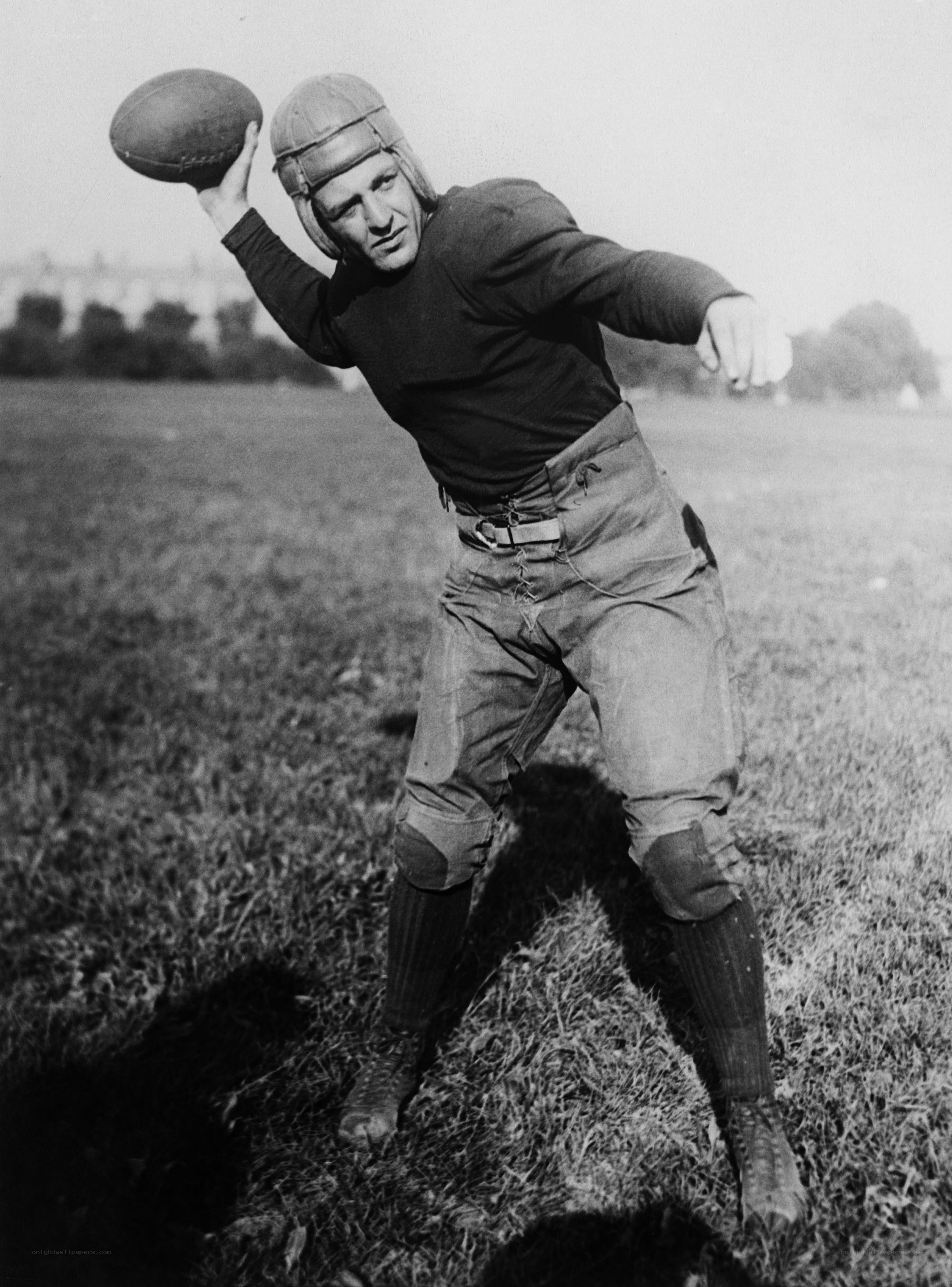 football player throwing ball
