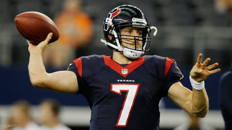Football Player Throwing Ball — Blue, Focused