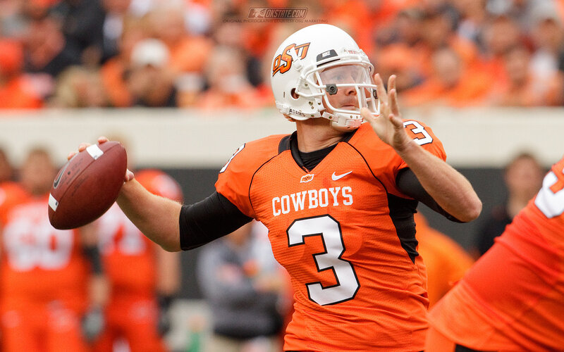 Football Player Throwing Ball — Orange