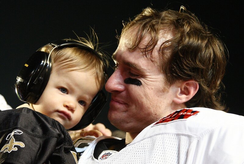 Football player with child