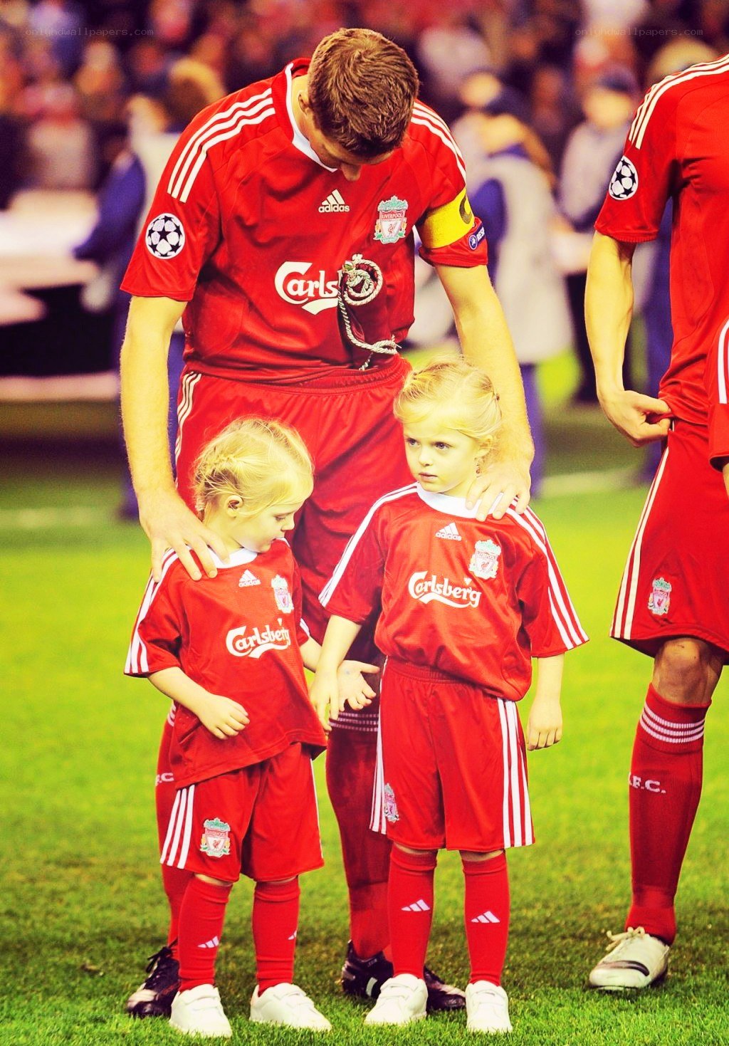 Football player with children