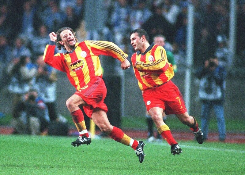Football players celebrating goal