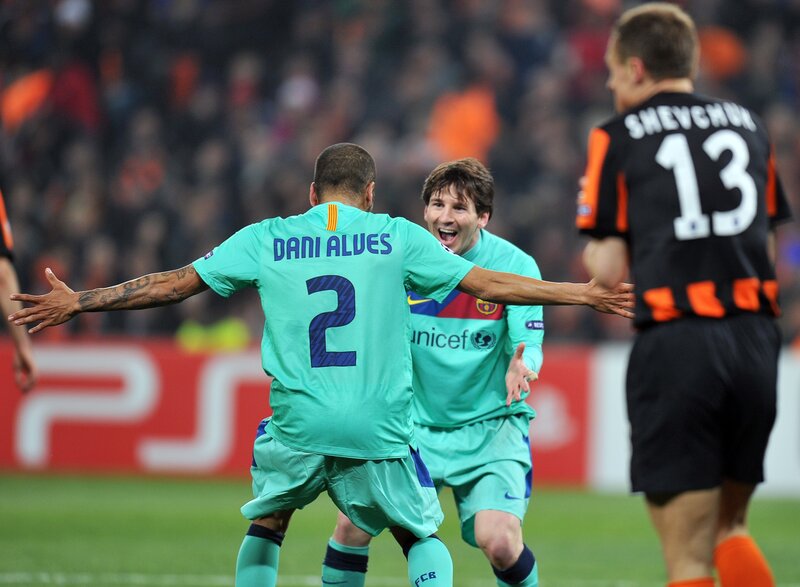 Football players celebrating goal