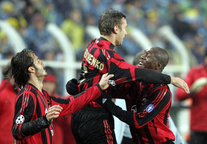 Football players celebrating goal