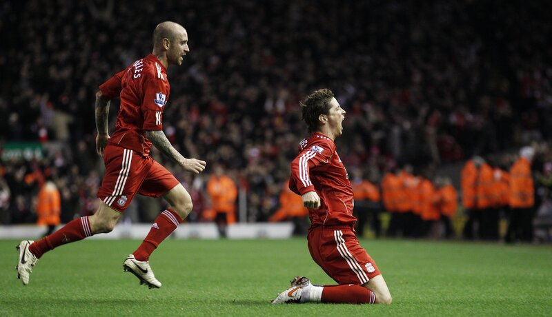 Football players celebrating goal