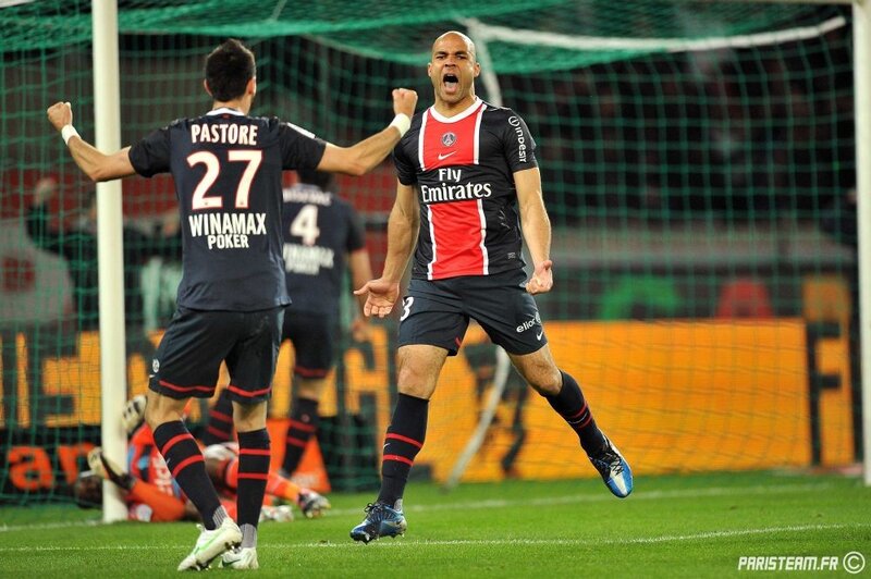 Football players celebrating goal