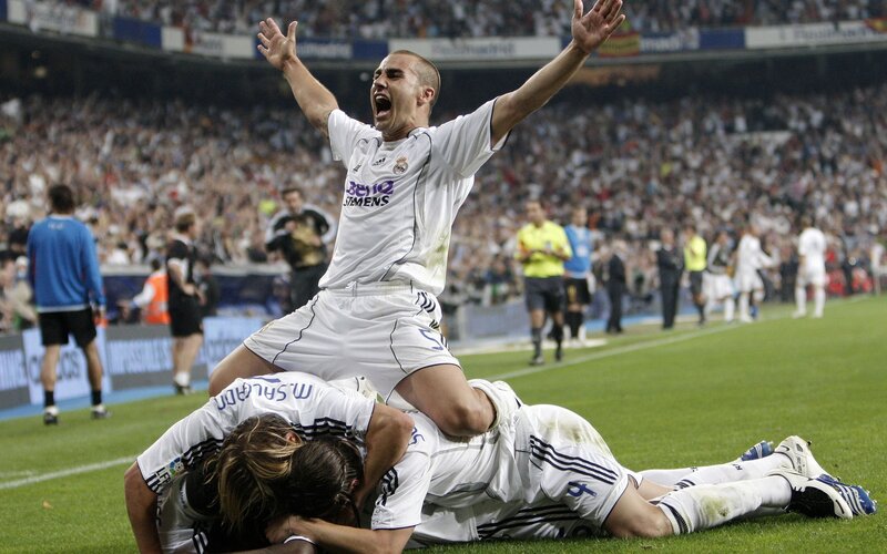Football players celebrating on field