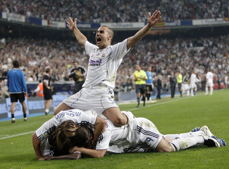 Football players celebrating on field