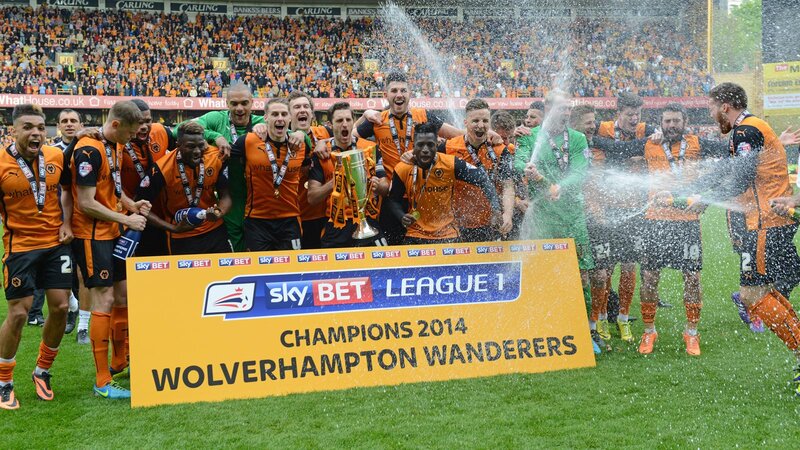 Football Players Celebrating — Orange, Celebratory, Afternoon