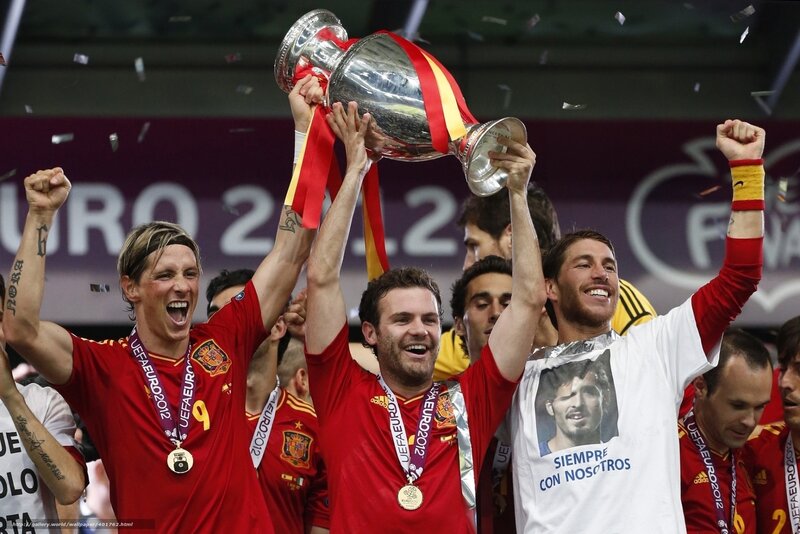 Football Players Celebrating — Red, Celebratory, Photograph, Trophy, Confetti