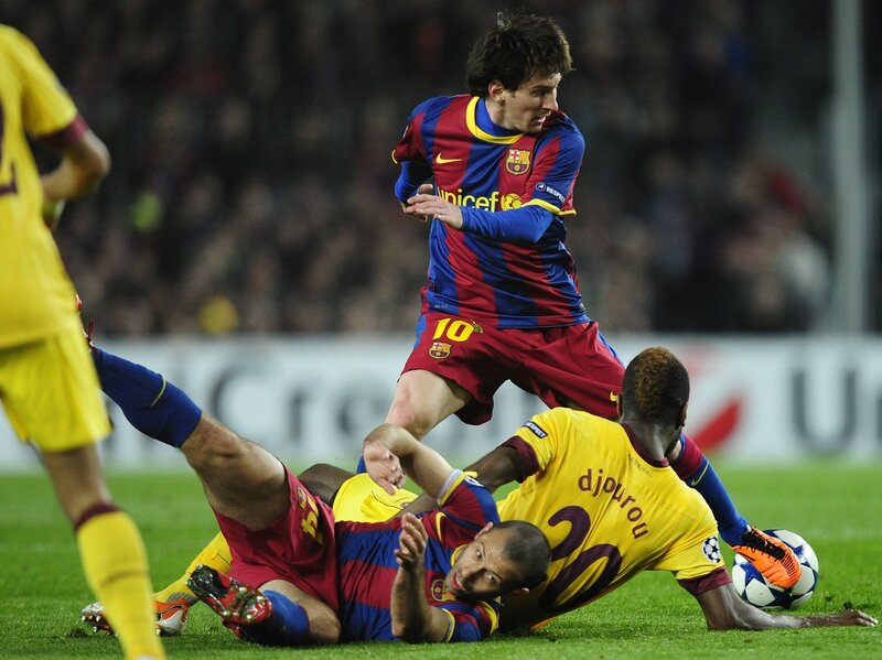 Football players in action during a match