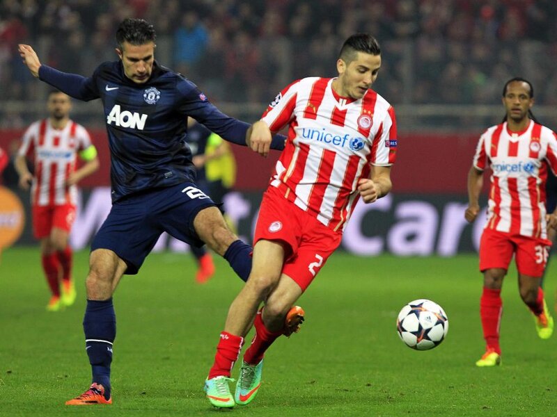 Football Players in Action — Green, Competitive