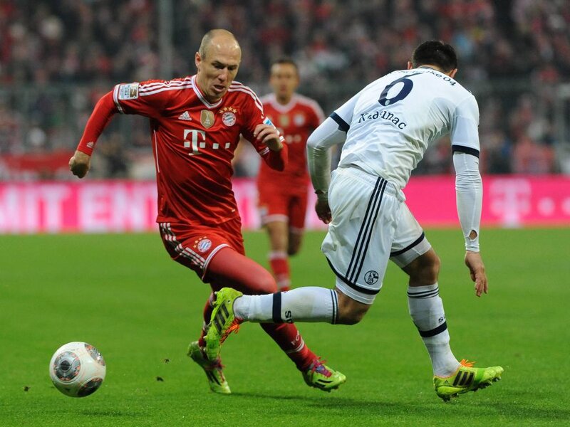 Football Players in Action — Red, Competitive