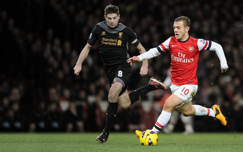 Football Players in Action — Red, Intense, Night