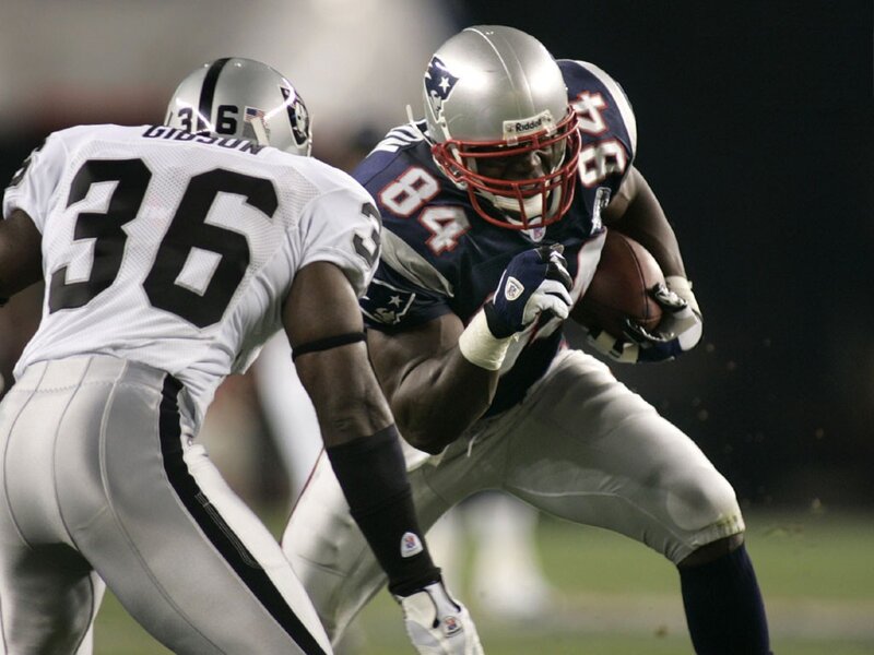 Football Players in Action — White
