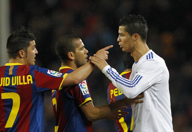 Football players in confrontation