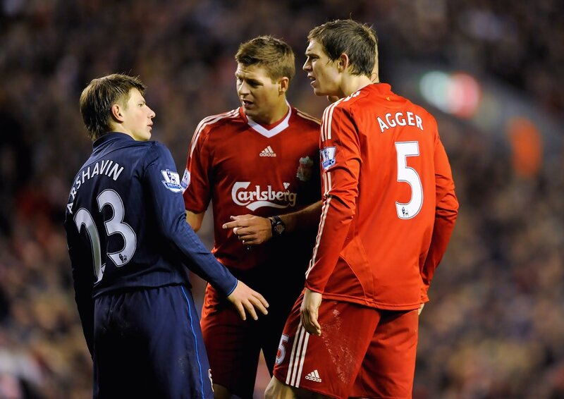 Football players in discussion