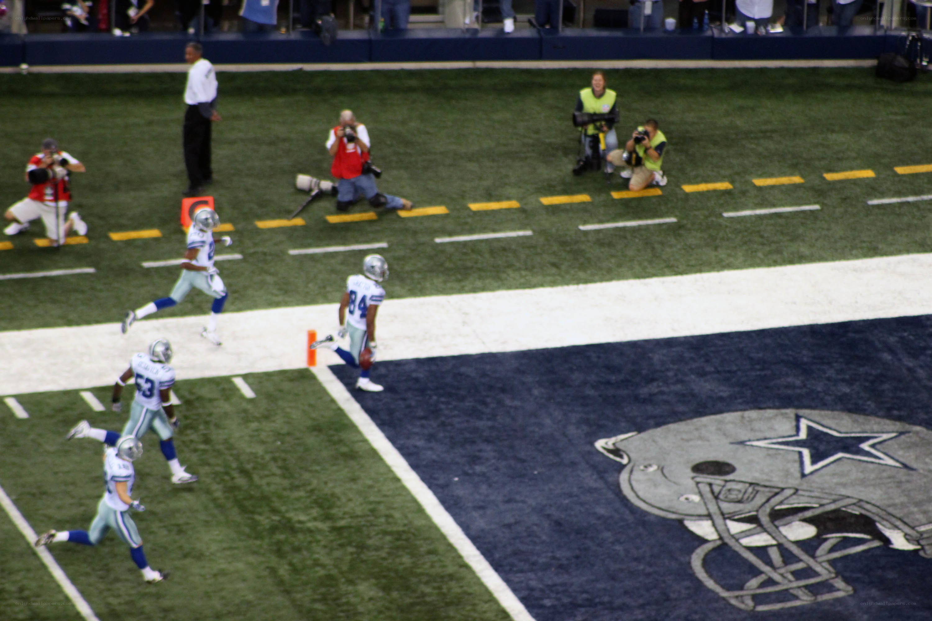 Football players in end zone
