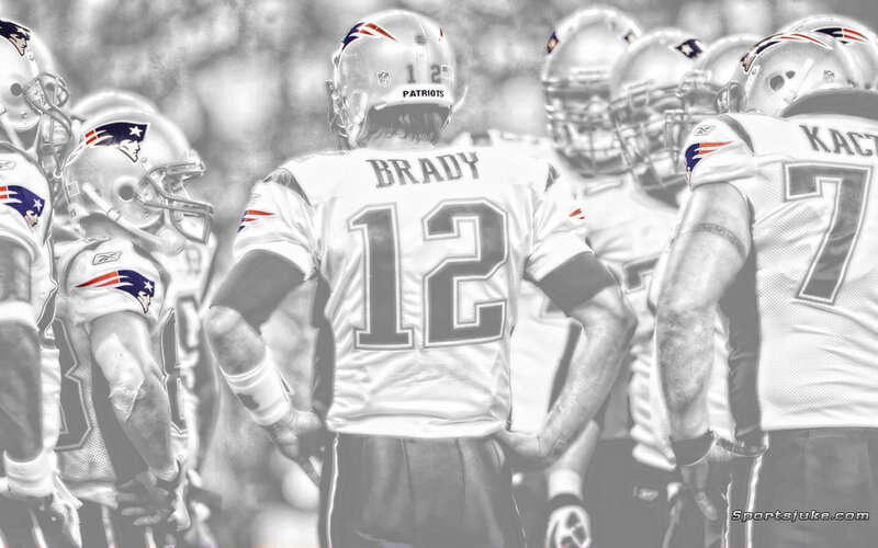 Football Players in Huddle