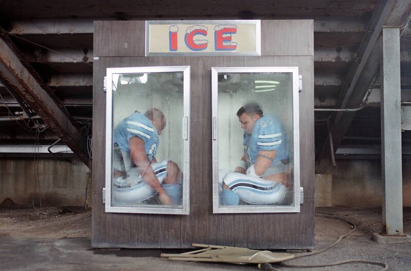 Football players in ice chambers