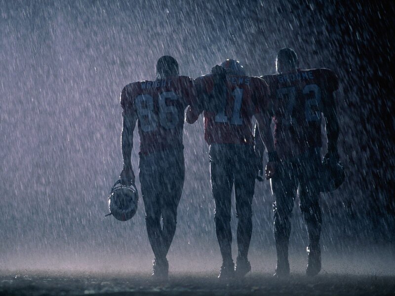 Football players in rain